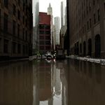 Water floods a street on October 30, 2012 in Lower Manhattan. <br/>